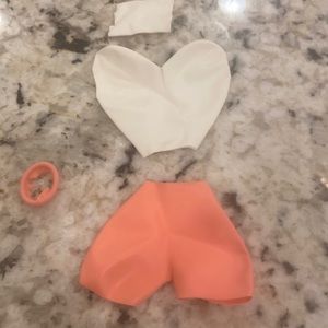 Homemade Barbie outfit made out of latex balloons